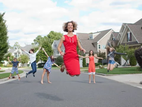 a group of people running on a street