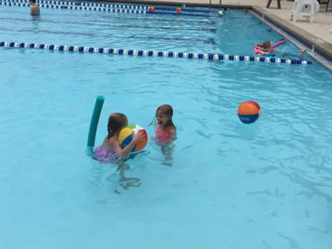 two girls in a pool