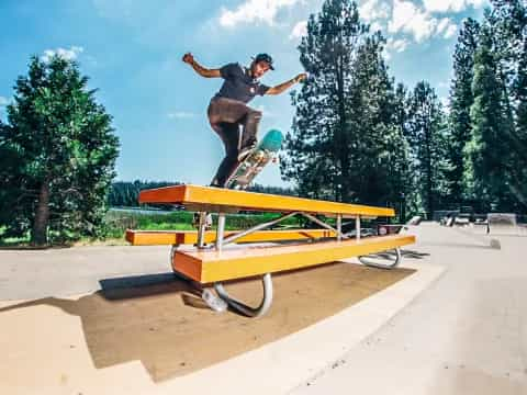 a man jumping on a skateboard