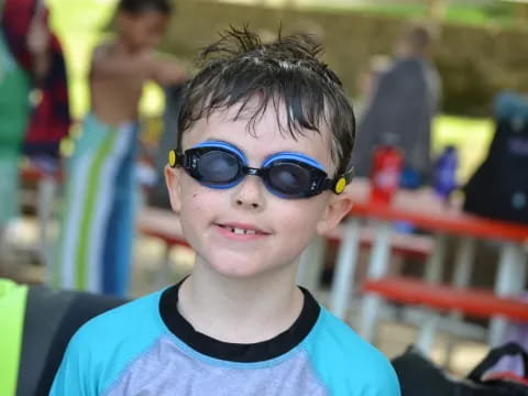 a boy wearing sunglasses