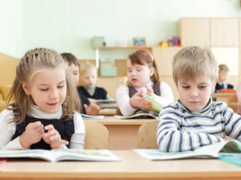 a group of children in a classroom