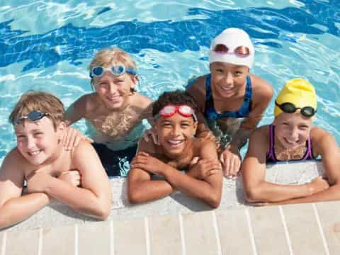 a group of people in a pool