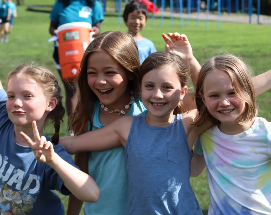 a group of girls posing for a photo