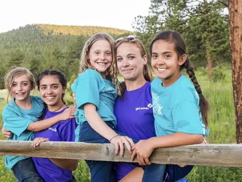 a group of girls posing for a picture