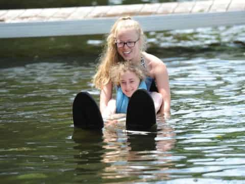 a person and a child in the water