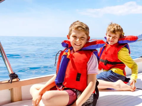 two boys on a boat