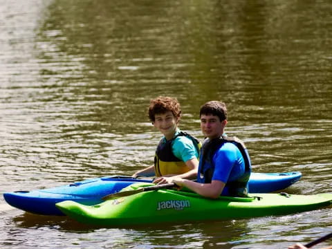 two boys in a canoe