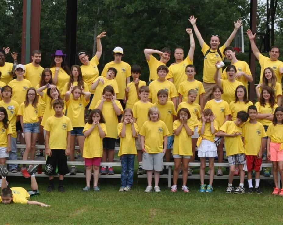 a group of people posing for a photo