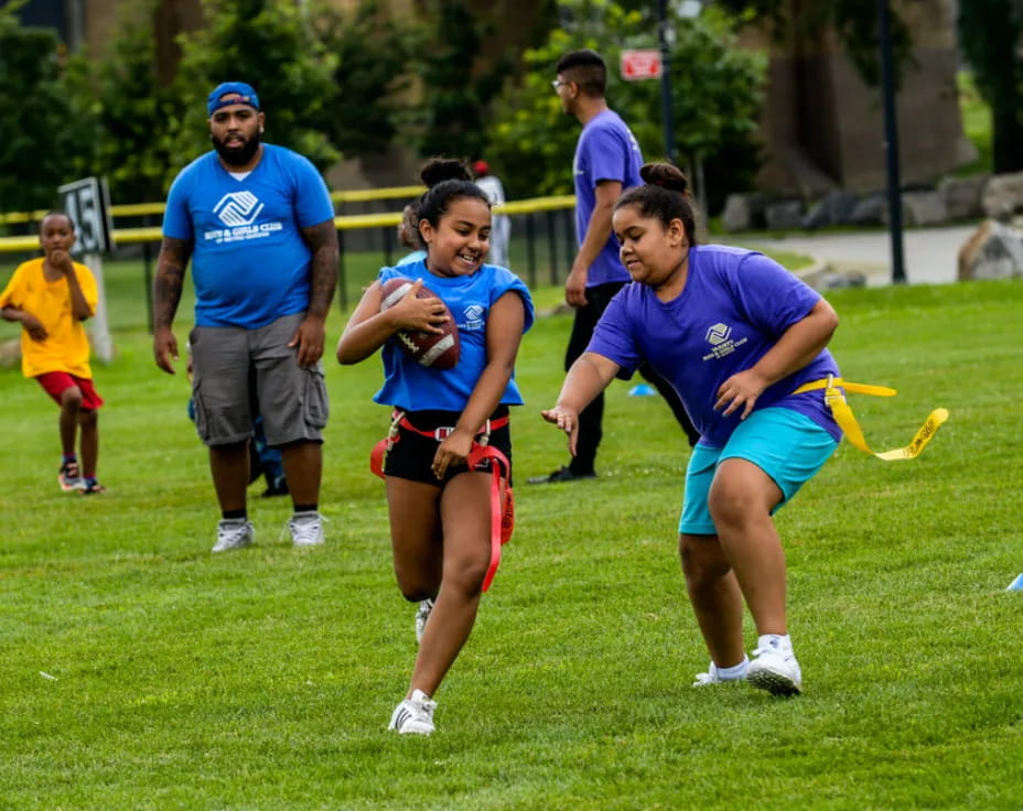 a group of people playing rugby