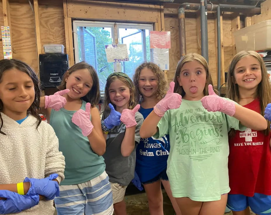 a group of girls posing for a photo