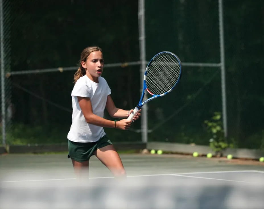 a woman playing tennis