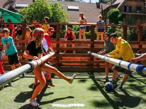 a group of people playing volleyball