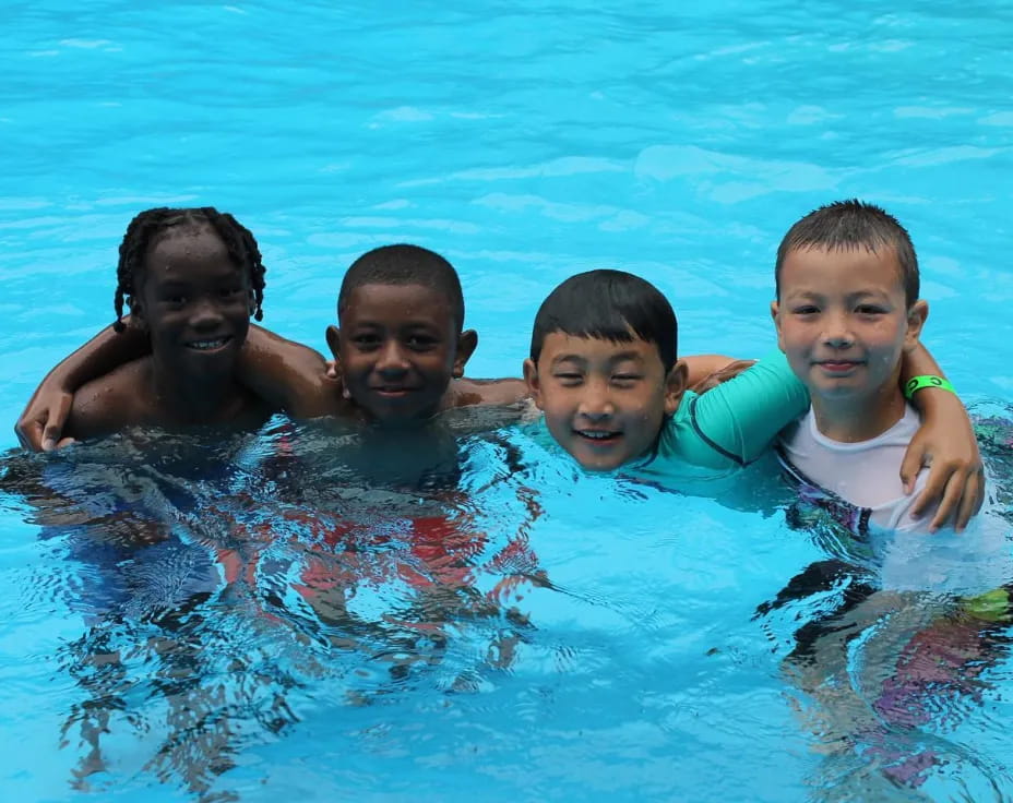 a group of people in a pool