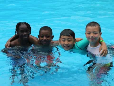 a group of people in a pool