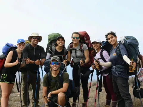a group of people with hiking gear