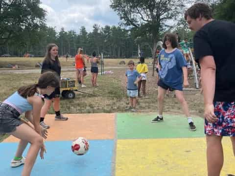 a group of people playing football