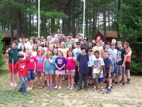 a group of people posing for a photo