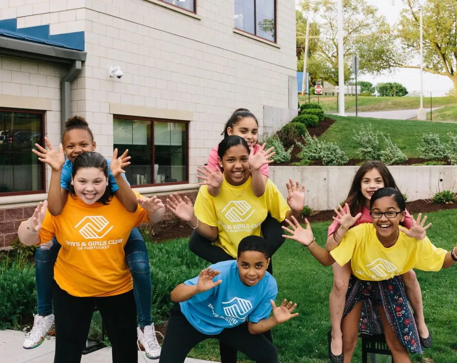 a group of people posing for a photo