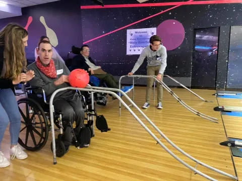 a group of people in wheelchairs