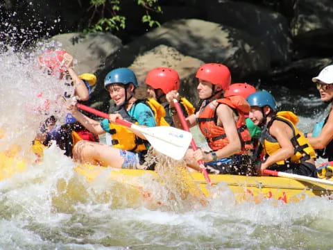 a group of people in a raft