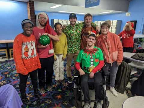 a group of people posing for a photo