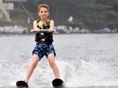 a boy on a jet ski