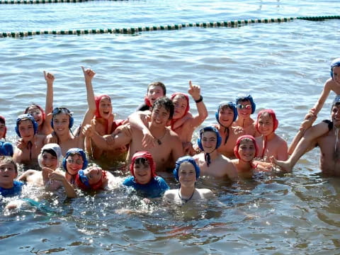 a group of people in a pool