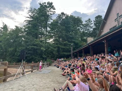 a large group of people sitting outside