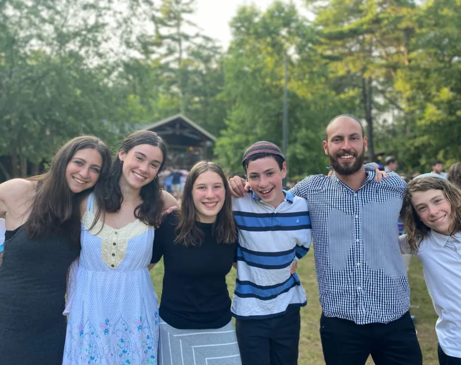 a group of people posing for a photo