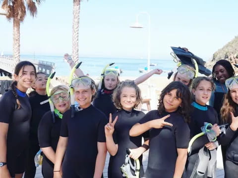a group of women in wet suits