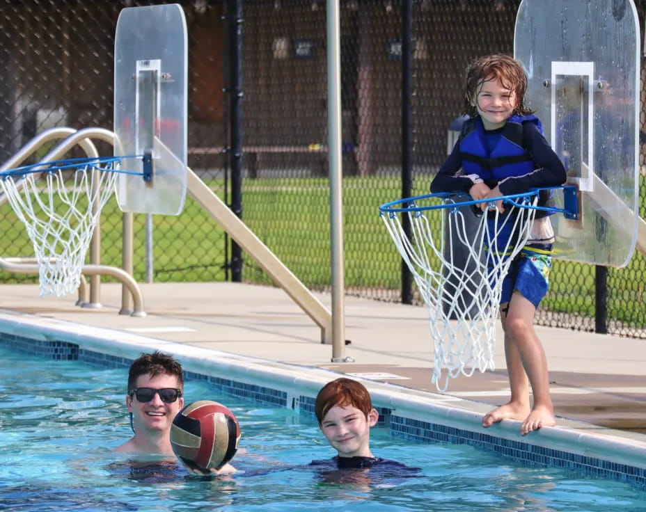 a group of people in a pool