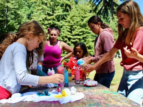 a group of people around a table