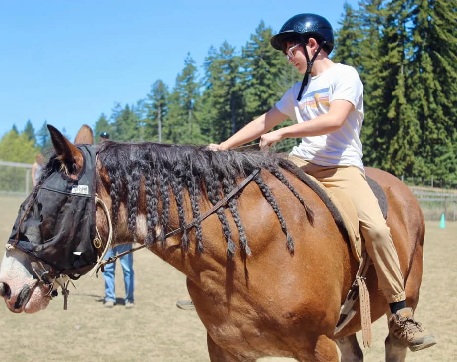 a man riding a horse