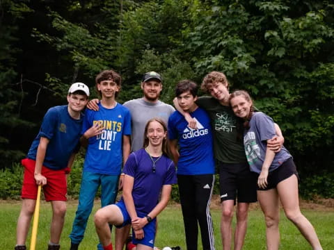 a group of people posing for a photo