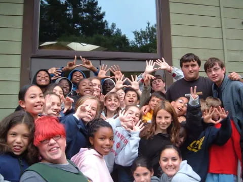 a group of people posing for a photo