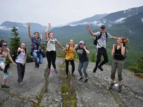 a group of people jumping in the air