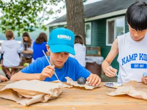 a couple of boys painting