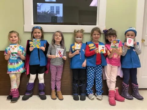 a group of children in clothing