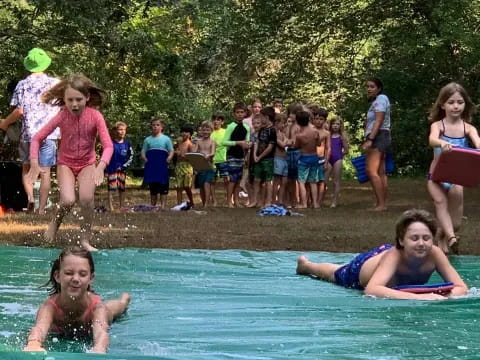 a group of people in a pool