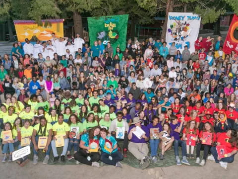 a large group of people posing for a photo