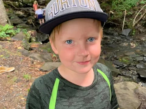 a boy wearing a hat