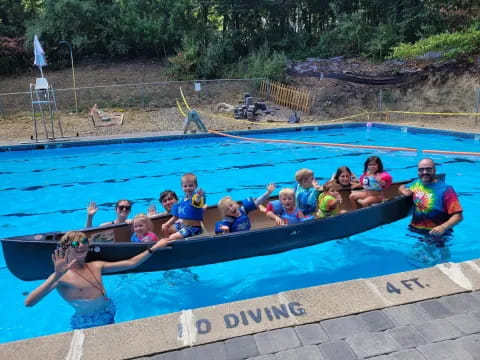 a group of people in a pool