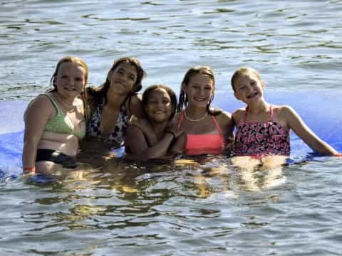 a group of women in the water