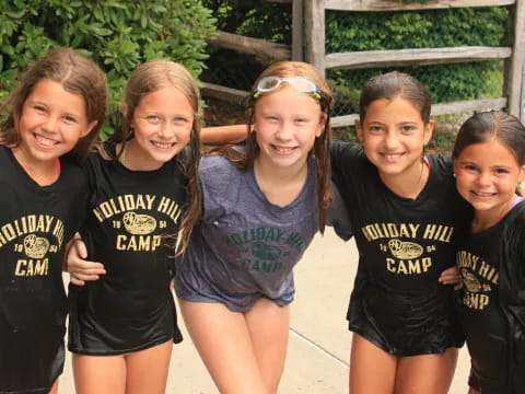 a group of girls posing for a photo