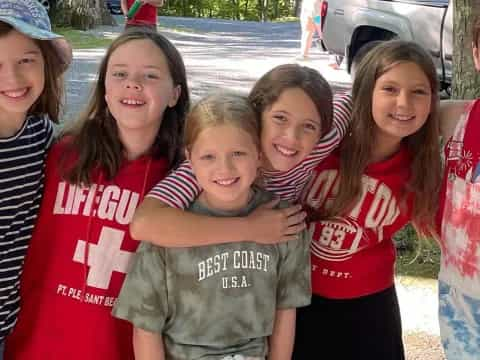 a group of children posing for a photo