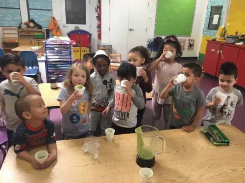 a group of children eating ice cream