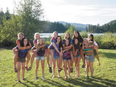 a group of women posing for a photo