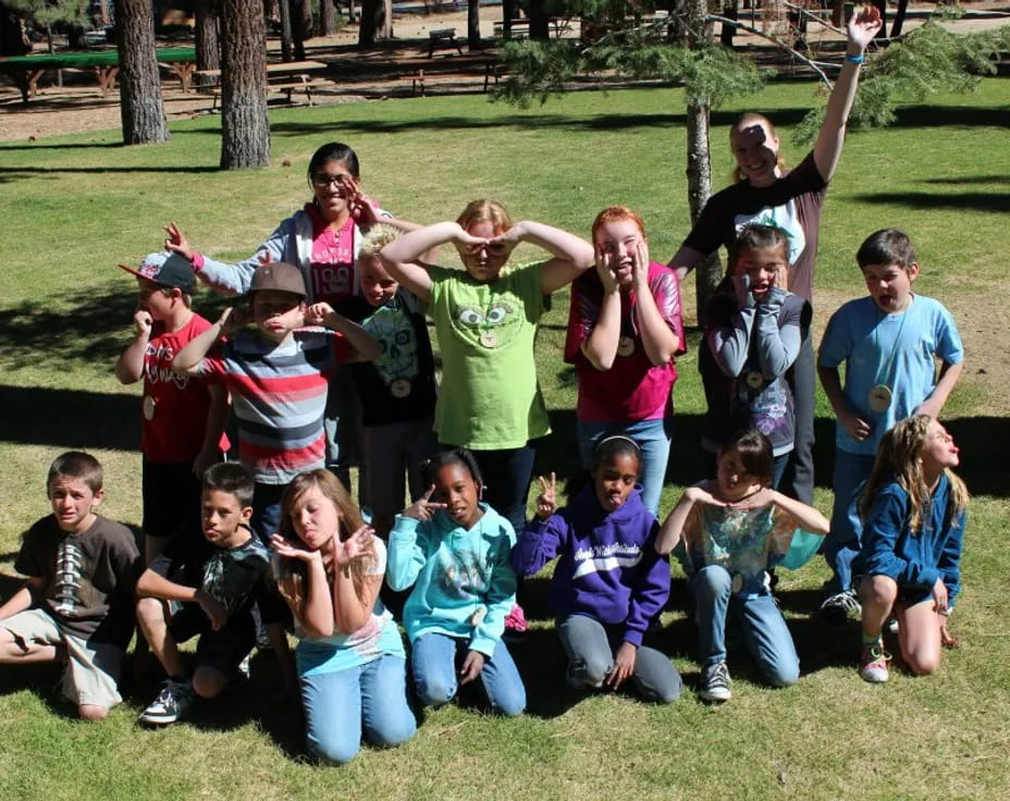 a group of people posing for a photo