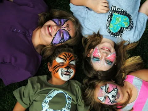 a group of people with face paint