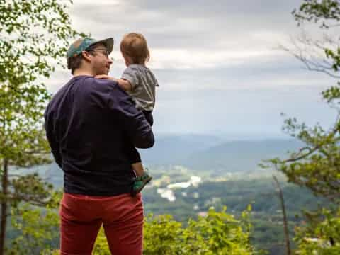 a person holding a baby